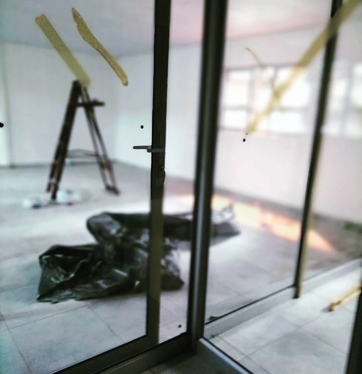 New aluminium window frame installation with protective film