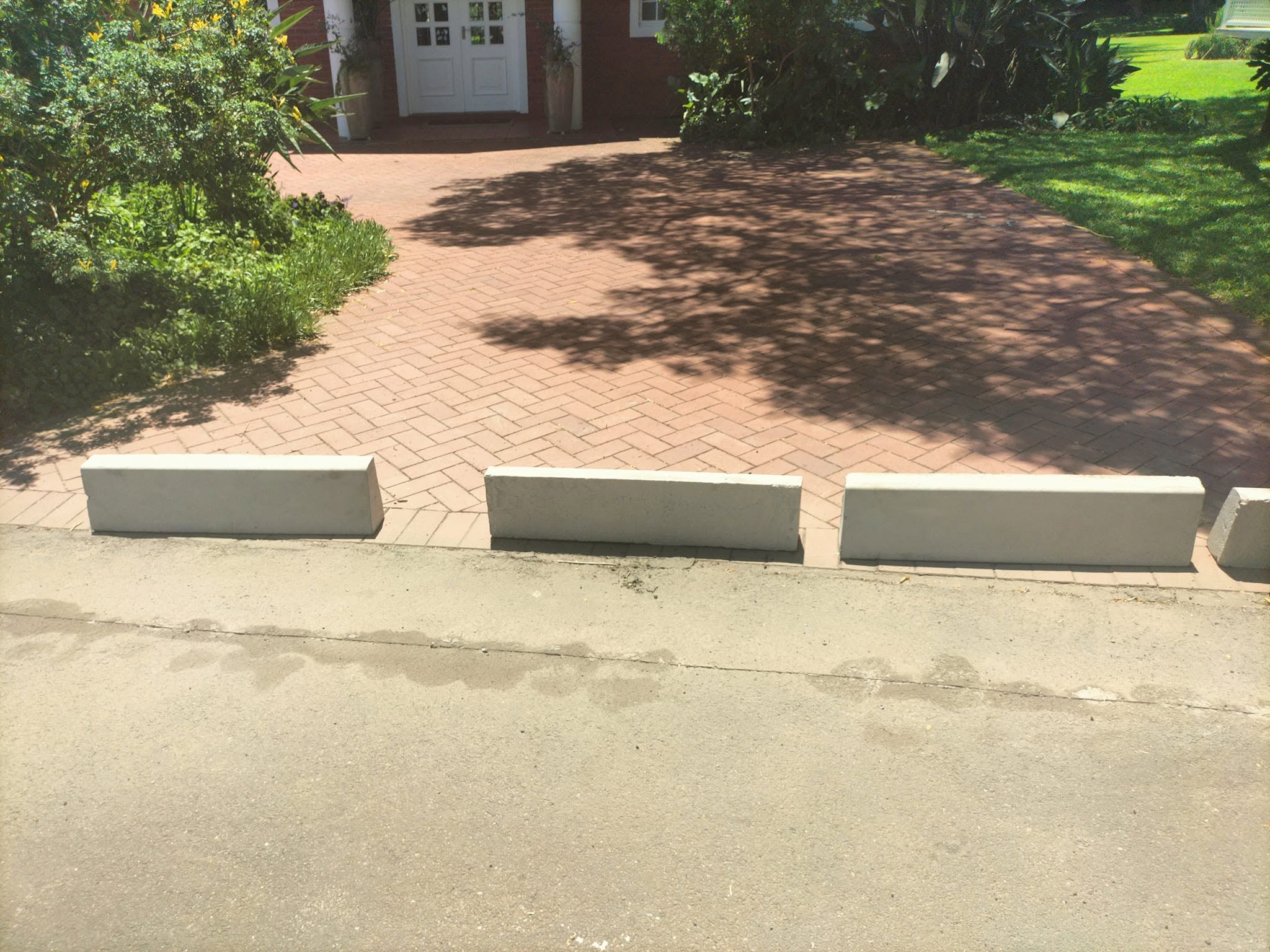 Fresh tar being laid with branded VSV roller